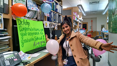 Ashley Pallathra receiving giant card
